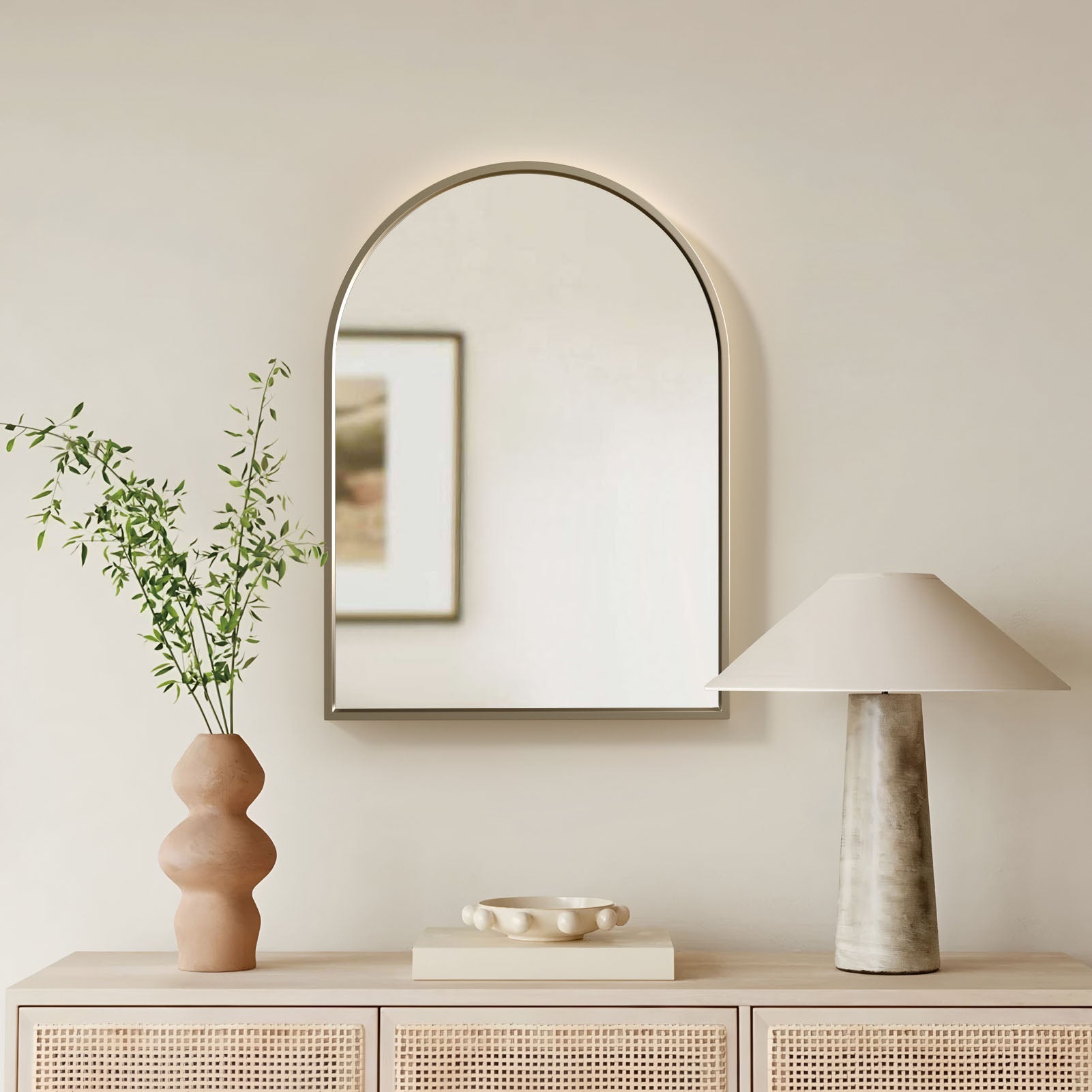 Arched wall mirror in gold finish for entryway decor