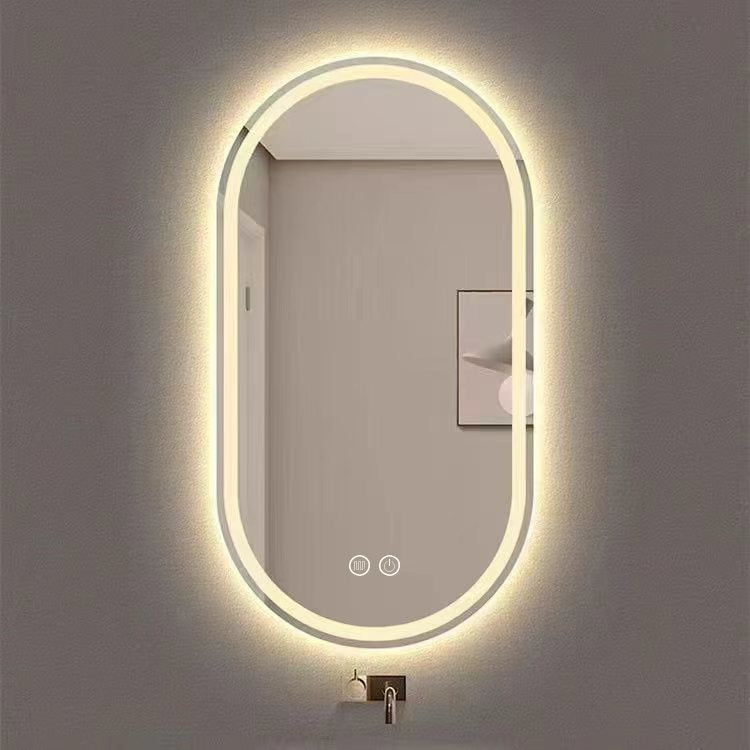 35×60 oval LED bathroom mirror with backlit halo lighting in modern bathroom